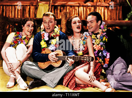 1940 American semi-musical comedy film directed by Victor Schertzinger and starring Bing Crosby, Dorothy Lamour and Bob Hope. Based on a story by Harry Hervey, the film is about two playboys trying to forget previous romances in the Colony of Singapore, where they meet a beautiful woman. Distributed by Paramount Pictures, the film marked the debut of the long-running and popular 'Road to ...' series of pictures spotlighting the trio, seven in all. The supporting cast features Charles Coburn, Anthony Quinn, and Jerry Colonna. It takes place in Singapore under British Rule. Credit: Hollywood Pho Stock Photo