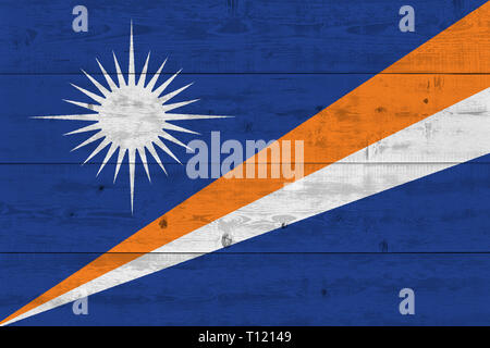 Marshall Islands flag painted on old wood plank. Patriotic background. National flag of Marshall Islands Stock Photo