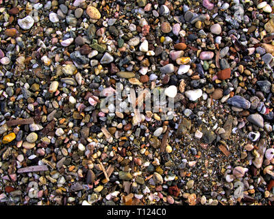 Close up on beach with stones. Nice texture, colorful, background image. Stock Photo
