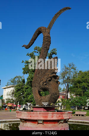 Battambang, Cambodia. Monument to peace, built of weapons destroyed between 2005 - 2007; in the shape of a Naga (a multi headed serpent). Stock Photo