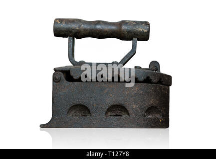 vintage old clothes charcoal iron forging presses isolated on white background Stock Photo