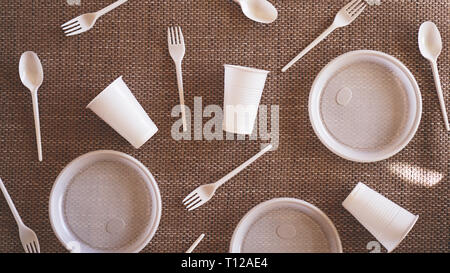 Plastic collection on beige background. Concept of Recycling plastic and ecology. Flat lay, top view Stock Photo