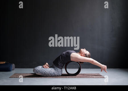 Beautiful Sporty Fit Yogini Woman Practices Yoga Asana Matsyasana - Fish  Pose In Studio Stock Photo, Picture and Royalty Free Image. Image 45529876.