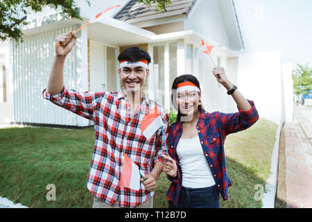 couple celebrating independence day of indonesia Stock Photo