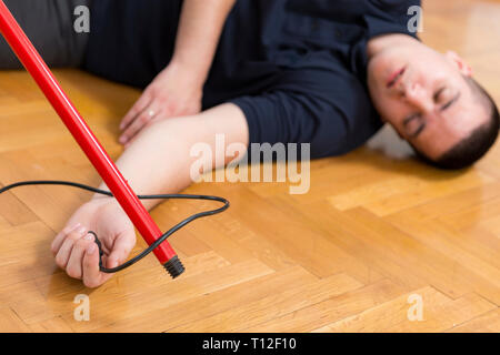 First Aid Training. Electric shock. Fist aid course. Stock Photo