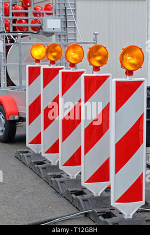 Roadworks Barrier With Amber Beacon Safety Lights Stock Photo