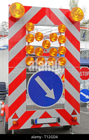 Direction Arrow Sign Signaling Traffic Diversion at Safety Warning Trailer Stock Photo