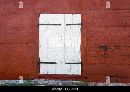 Paint on old warehouse door peeling, Sisimiut, Greenland Stock Photo