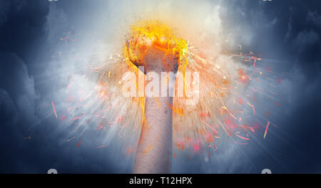 Hand hits strongly and makes fire beam around  Stock Photo