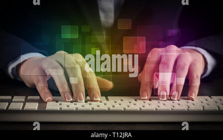 Business woman typing on keyboard with colorful concept  Stock Photo