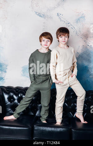 Stylish young teen posing at studio. Kids fashion concept. Stock Photo