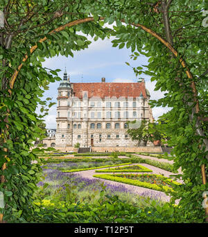 View of Palace of Güstrow (Germany) throu pergola Stock Photo