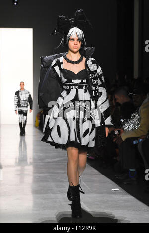 Model Stella Lucia walks on the runway during the Public School Fashion