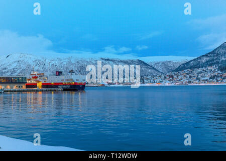 Early evening winter light above the town of Tromso in Norway. Stock Photo