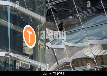 A familiar orange and white T for Train station sign at the Barangaroo entrance to Wynyard station in Sydney city, New South Wales, Australia Stock Photo