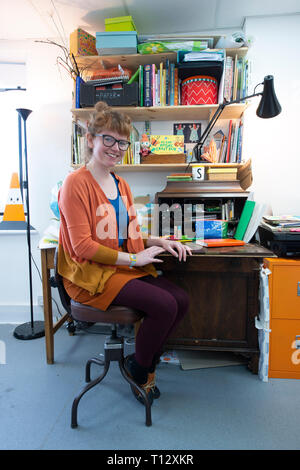 A Creative Artistic Illustrator Photographed In Their Interesting Studio Work Space At Their Desk Stock Photo Alamy