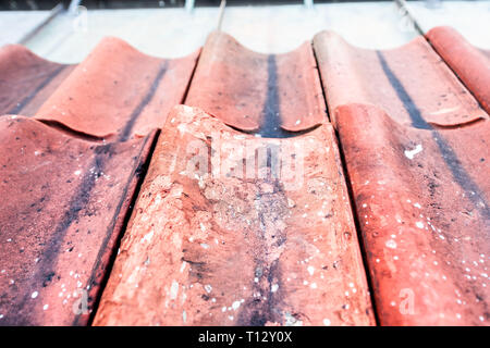 Closeup of red roof tiles in Warsaw, Poland colorful old historic architecture in old town market square texture Stock Photo