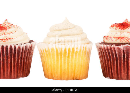 Close up on three delicious birthday cupcakes, isolated on white background. Stock Photo