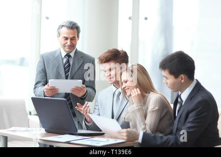 close up.businessman and business team analyzing financial data. photo with copy space Stock Photo