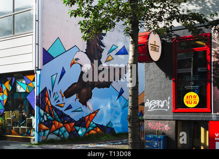 Old house painted with murals in city center of Reykjavik, Iceland Stock Photo