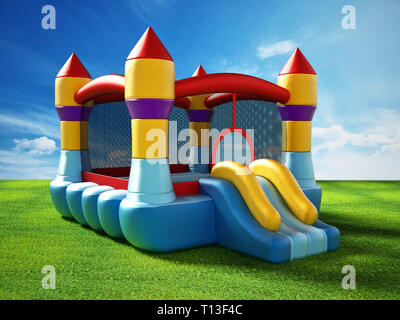 Bounce house standing on green grass. 3D illustration. Stock Photo