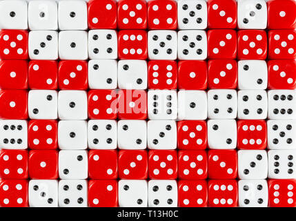 Background of 70 random ordered white and red dices Stock Photo