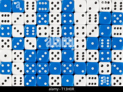 Background of 70 random ordered white and blue dices Stock Photo