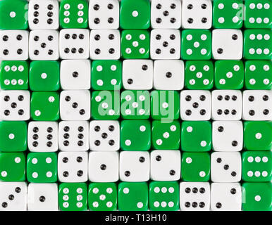 Background of 70 random ordered white and green dices Stock Photo