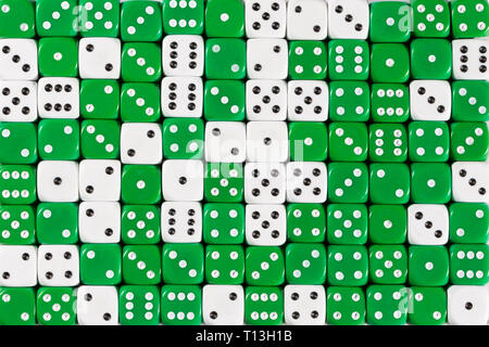 Background patteren of random ordered green and white dices Stock Photo