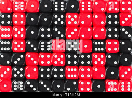 Background of 70 random ordered black and red dices Stock Photo