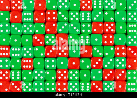 Background patteren of random ordered green and red dices Stock Photo