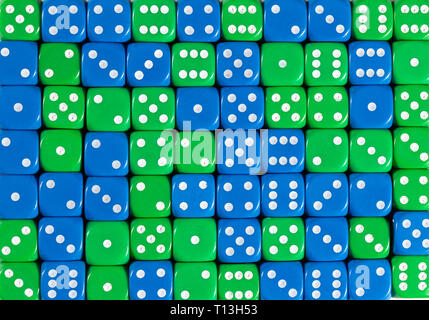 Background of 70 random ordered blue and green dices Stock Photo