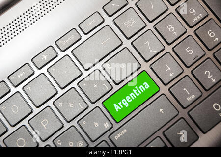 green button on the PC with the word Argentina Stock Photo
