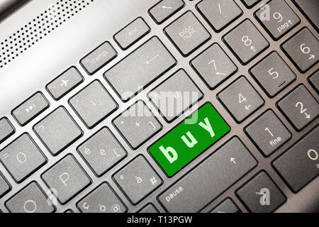 green computer key with the word Buy Stock Photo
