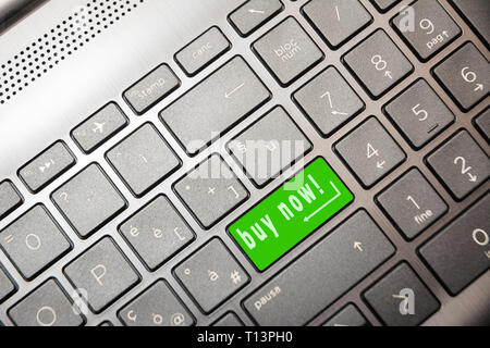 green computer key with the word Buy Now Stock Photo
