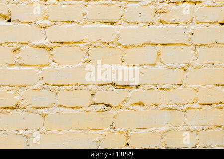 Yellow bricks pattern on wall for abstract background. Stock Photo