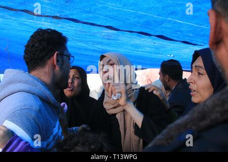 March 23, 2019 - Al-Mograga, The Gaza Strip, Palestine - Palestinians mourners Nidal Shatat 29 years old from al-Mograga in the middle of the Gaza strip during his funeral, Nidal killed by Israeli troops during his participation in the Great March of Return eastern of the Gaza strip yesterday. Credit: Mahmoud Khattab/Quds Net News/ZUMA Wire/Alamy Live News Stock Photo