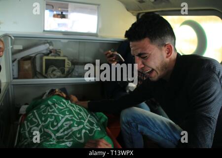 March 23, 2019 - Al-Mograga, The Gaza Strip, Palestine - Palestinians mourners Nidal Shatat 29 years old from al-Mograga in the middle of the Gaza strip during his funeral, Nidal killed by Israeli troops during his participation in the Great March of Return eastern of the Gaza strip yesterday. Credit: Mahmoud Khattab/Quds Net News/ZUMA Wire/Alamy Live News Stock Photo