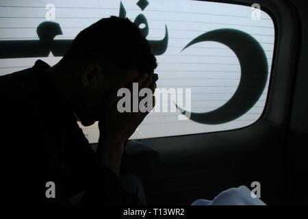 March 23, 2019 - Al-Mograga, The Gaza Strip, Palestine - Palestinians mourners Nidal Shatat 29 years old from al-Mograga in the middle of the Gaza strip during his funeral, Nidal killed by Israeli troops during his participation in the Great March of Return eastern of the Gaza strip yesterday. Credit: Mahmoud Khattab/Quds Net News/ZUMA Wire/Alamy Live News Stock Photo