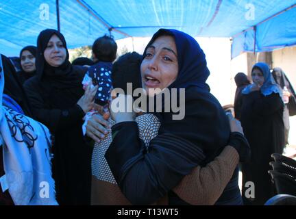 March 23, 2019 - Al-Mograga, The Gaza Strip, Palestine - Palestinians mourners Nidal Shatat 29 years old from al-Mograga in the middle of the Gaza strip during his funeral, Nidal killed by Israeli troops during his participation in the Great March of Return eastern of the Gaza strip yesterday. Credit: Mahmoud Khattab/Quds Net News/ZUMA Wire/Alamy Live News Stock Photo