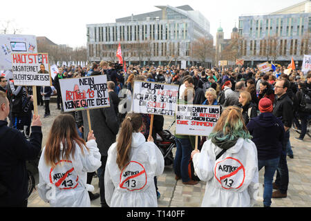Magdeburg, Germany. 23rd Mar, 2019. Young people demonstrate on the cathedral square with signs and slogans under the motto 'Save the Internet' against upload filters on the occasion of the planned EU copyright reform. Shortly before the decisive vote on the reform of copyright in the EU Parliament, thousands in Europe protested against the project. Opponents of the reform and especially of the controversial Article 13 had announced demonstrations in about 20 countries. Credit: Peter Gercke/dpa-Zentralbild/dpa/Alamy Live News Stock Photo