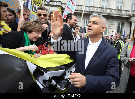 London, UK. 23rd Mar 2019.London, UK. 23rd Mar, 2019.Sadiq Khan, Mayor of London, with Delia Smith (green scarf) and Richard Bacon (dark glasses - presenter), prepares to get to the front of the march as hundreds of thousands of people take part in a People's March protest to try and get a People's Vote on Brexit. Britain was due to leave the EU on March 29, 2019, but this is now in doubt. The march started in Park Lane and finished in Westminster, outside the Houses of Parliament, London, UK on March 23, 2019. Credit: Paul Marriott/Alamy Live News Credit: Paul Marriott/Alamy Live News Stock Photo