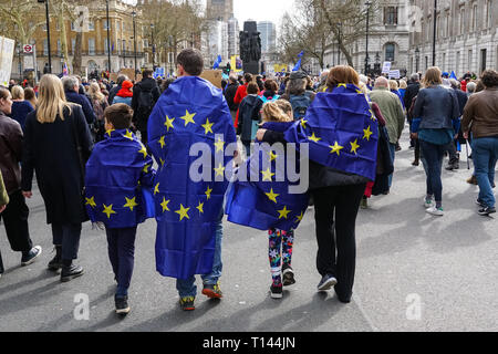 London, UK. 23rd March, 2019. Family with EU flags join the People's Vote March against Brexit Stock Photo