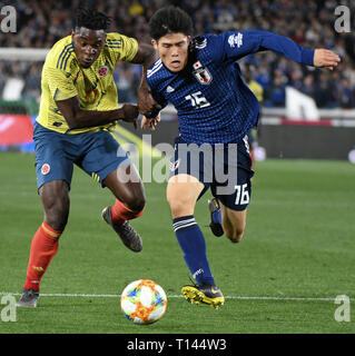 Tokyo, Japan. 22nd Mar, 2019. D. Zapata of Colombia (left) and No. 16 Tomiyasu of Japan fight for the soccer ball during the Kirin Challenge Cup 2019 between Colombia and Japan at the International Yokohama Stadium in Yokohama Japan. Friday, March 22, 2019. Photo by: Ramiro Agustin Vargas Tabares Credit: Ramiro Agustin Vargas Tabares/ZUMA Wire/Alamy Live News Stock Photo