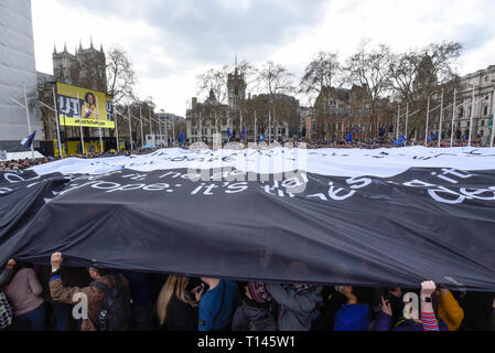London, UK.  23 March 2019. A huge banner, organised by the group Led by Donkeys, is unfurled and carried overhead by people taking part in a rally in Parliament Square after the 'Put It To The People March', on what was supposed to be six days before the UK was due to leave the EU, before an extension to the departure date was given.  Protesters demand that the public is given a final say on Brexit as support for the Prime Minister's withdrawal plan continues to recede.  Credit: Stephen Chung / Alamy Live News Stock Photo