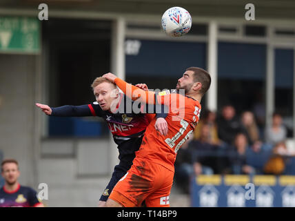 Luton Town's Elliot Lee and Doncaster Rovers Ali Crawford challenge for the ball during the Sky Bet League One match at Kenilworth Road, Luton. Stock Photo