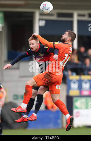 Luton Town's Elliot Lee and Doncaster Rovers Ali Crawford challenge for the ball during the Sky Bet League One match at Kenilworth Road, Luton. Stock Photo