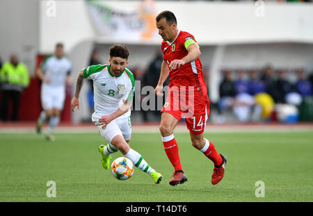 Republic of Ireland's Sean Maguire and Gibraltar's Roy Chipolina (right) battle for the ball during the UEFA Euro 2020 Qualifying, Group D match at the Victoria Stadium, Gibraltar. Stock Photo