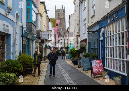 Tourists and locals wandering along Foss Street in Dartmouth, Devon, UK Stock Photo