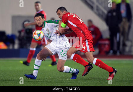 Republic of Ireland's Harry Arter and Gibraltar's Roy Chipolina (right) battle for the ball during the UEFA Euro 2020 Qualifying, Group D match at the Victoria Stadium, Gibraltar. Stock Photo